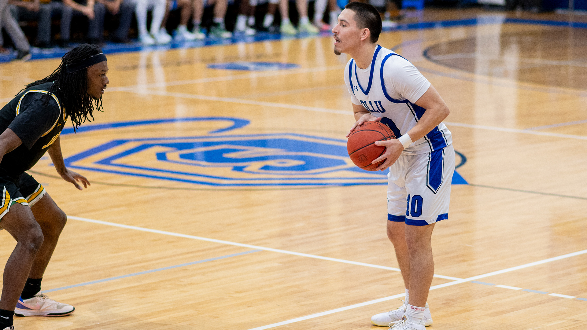 Rob Gil led the Saints in rebounds and assists.