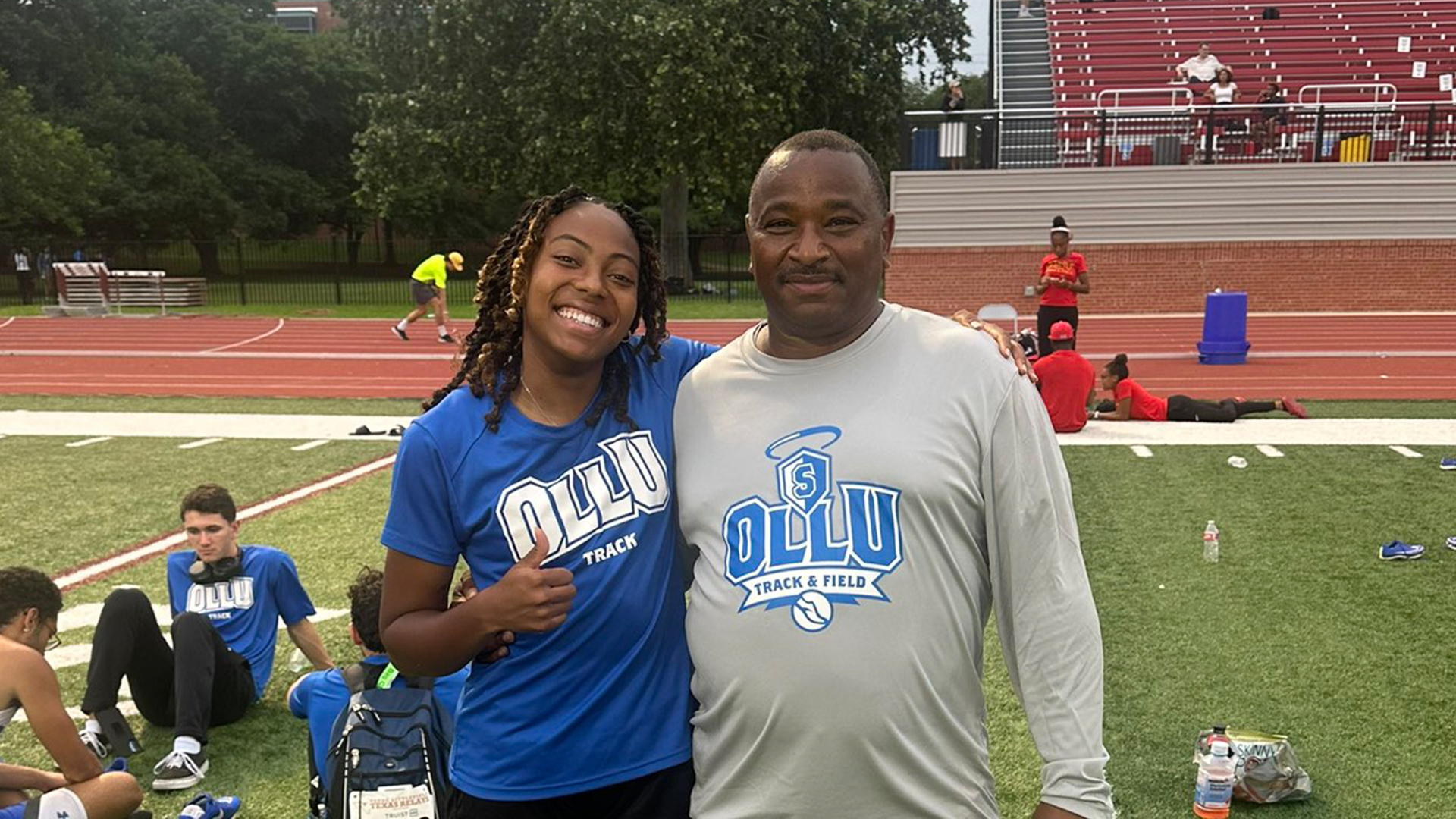 Loreaya Turner is pictured with Assistant Coach Henry Spillers.